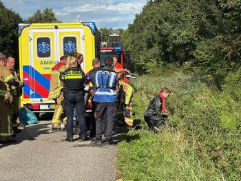 Vrouw belandt met scootmobiel te water